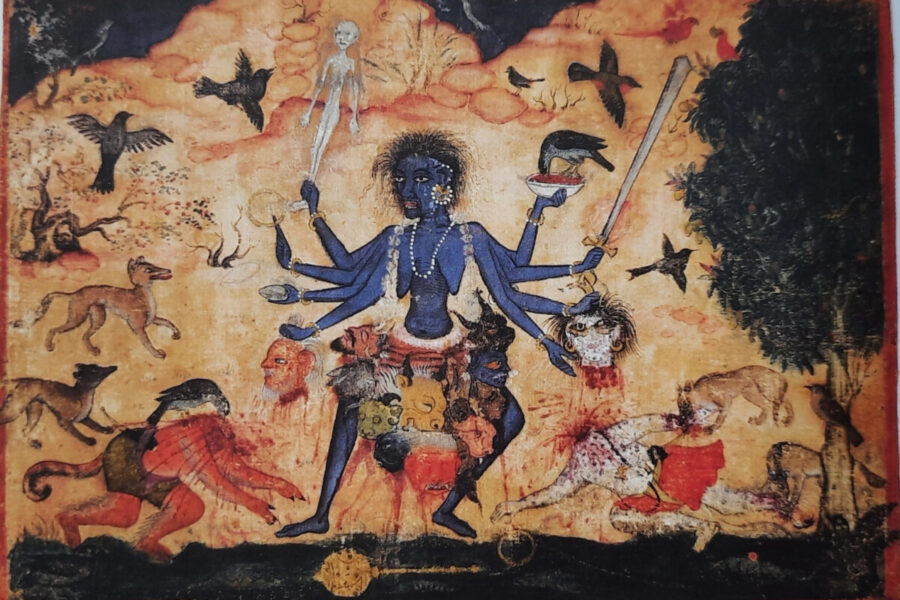 Goddess Chamunda, the raw and untamed manifestation of Durga, stands surrounded by birds and beasts, holding the decapitated heads of Chanda and Munda in her hands