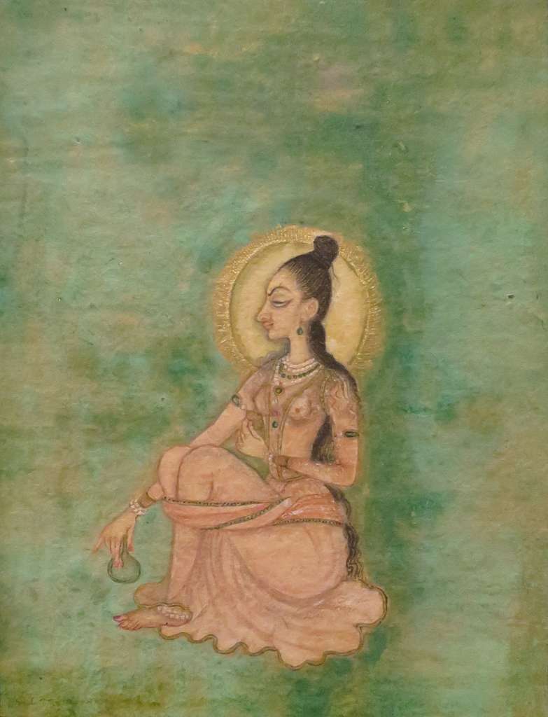 A delicate 18th-century painting of a seated female yogini against a green wash background. Adorned in fine jewelry and translucent garments, she appears absorbed in radiant trance.