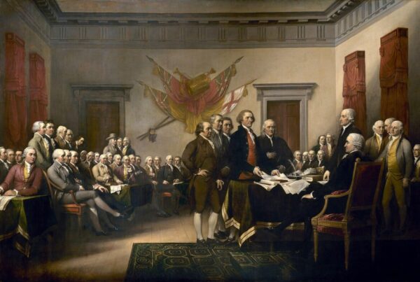 Declaration of Independence,” depicting the Continental Congress gathered in a formal chamber as the draft is presented